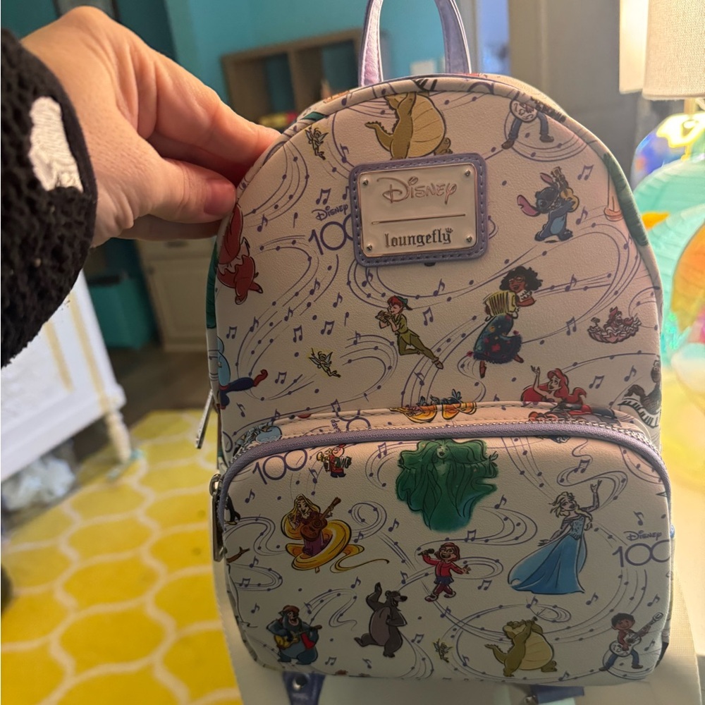 Disney 100 year Loungefly Cream Backpack with Disney Characters